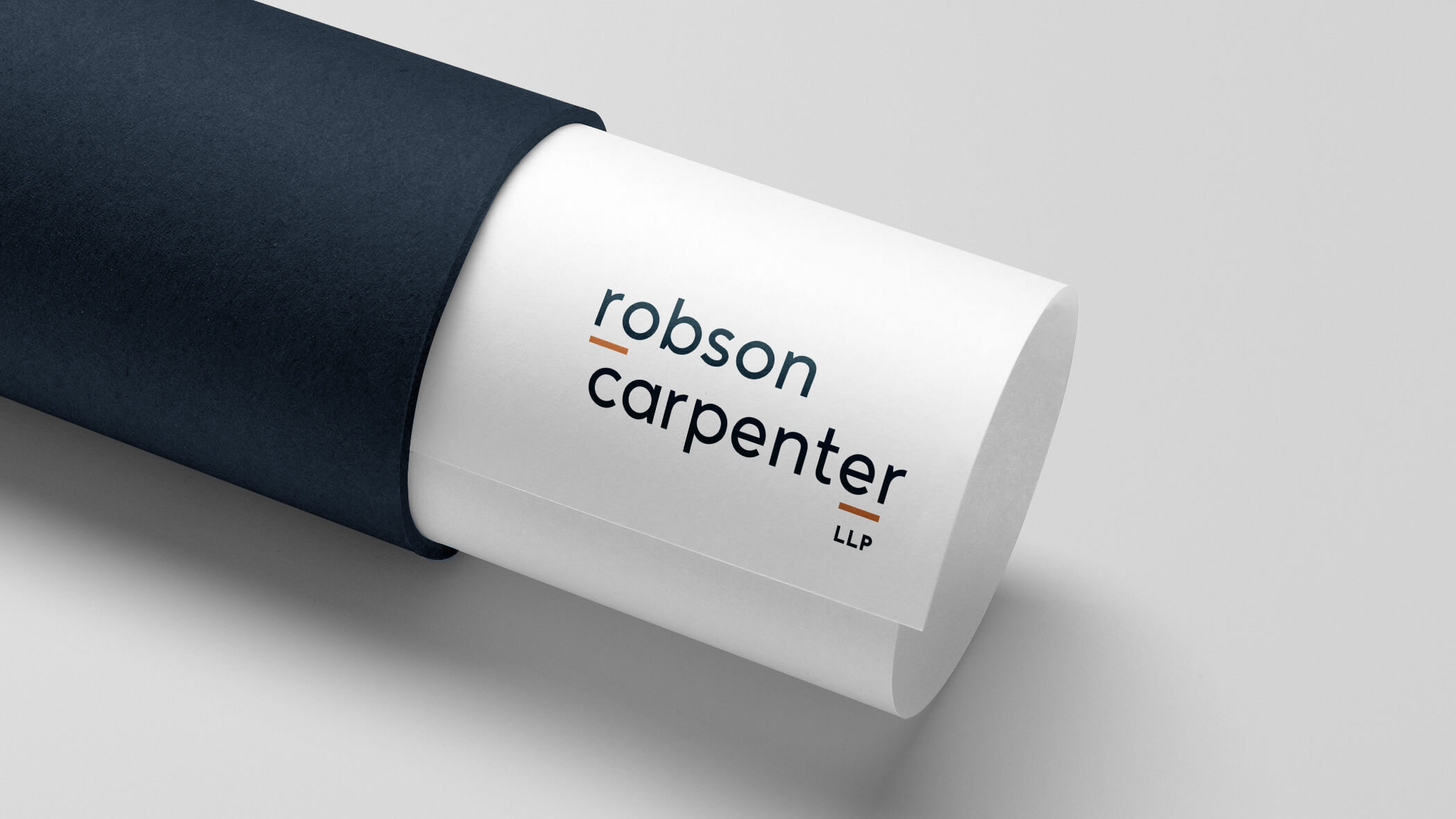Robson-Carpenter_Logo-on-paper-that-is-in-a-mailing-tube