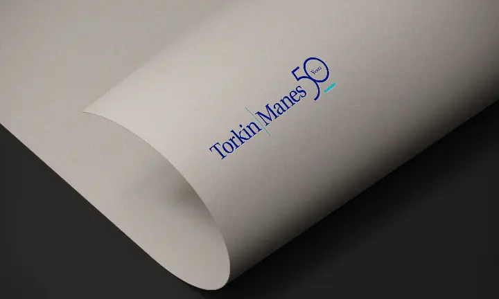 Torkin Manes 50th Anniversary Logo